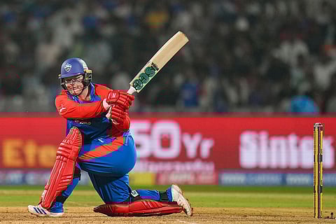 Delhi Capitals' Lizelle Lee plays a shot during a Women's Premier League (WPL) T20 cricket match between Gujarat Giants and Delhi Capitals, at the DY Patil Stadium, in Navi Mumbai.
