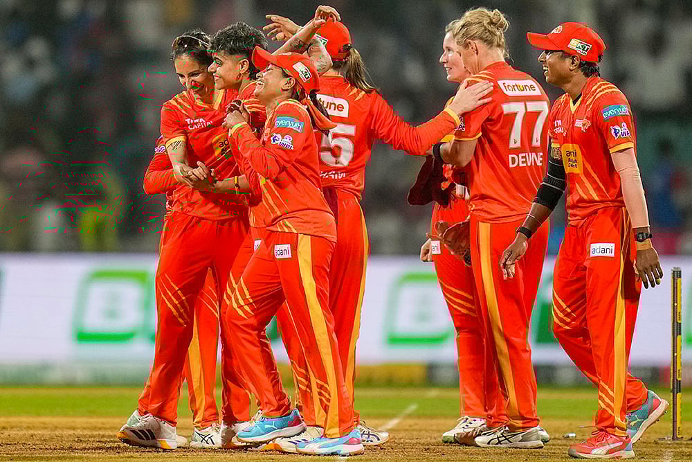 Gujarat Giants' players celebrate after winning the Women's Premier League (WPL) T20 cricket match between Gujarat Giants and Delhi Capitals, at the DY Patil Stadium, in Navi Mumbai. - | Photo: PTI/Kunal Patil