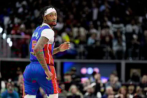 Detroit Pistons forward Ronald Holland II reacts after making a 3-point basket during the first half of an NBA basketball game against the Los Angeles Clippers in Detroit.