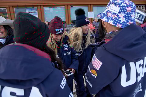 Members of the U.S. Women's Ski Team including Lindsey Vonn, center, with Tricia Mangan, of Buffalo, NY, left, joke together after making a dancing video for social media at Copper Mountain, Colo.