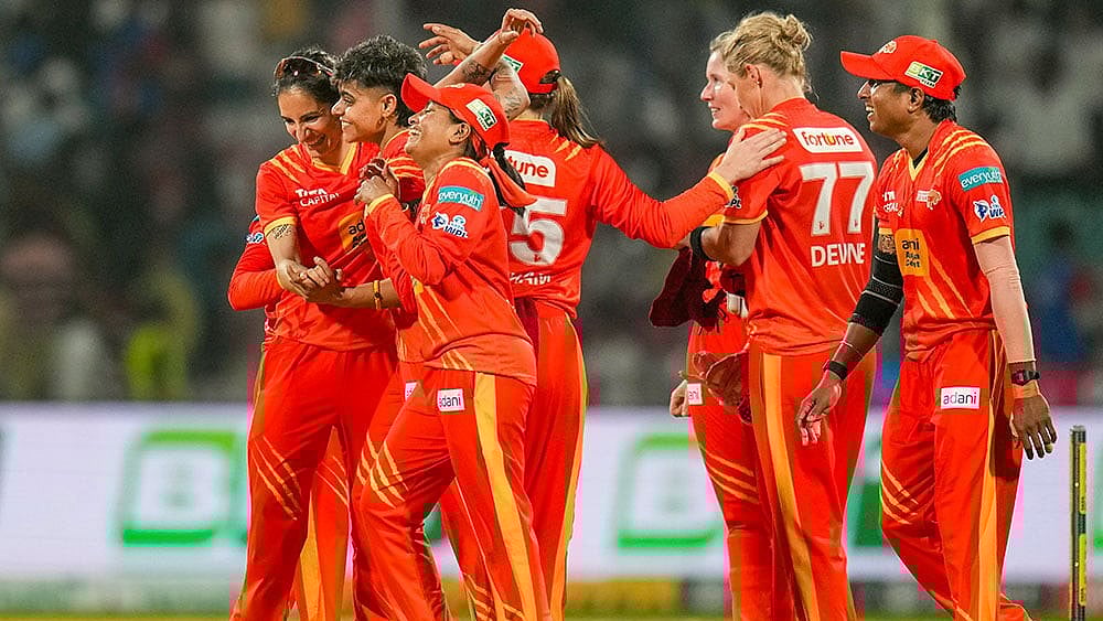 Gujarat Giants' players celebrate after winning the Women's Premier League (WPL) T20 cricket match between Gujarat Giants and Delhi Capitals, at the DY Patil Stadium, in Navi Mumbai. - | Photo: PTI/Kunal Patil