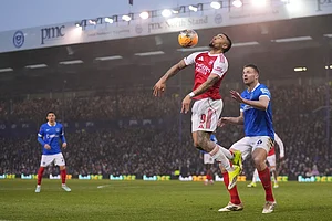 | Photo: AP/Kin Cheung : Arsenal's Gabriel Jesus receives the ball in front of Portsmouth's Conor Shaughnessy during the FA Cup third round soccer match between Portsmouth and Arsenal in Portsmouth, England.