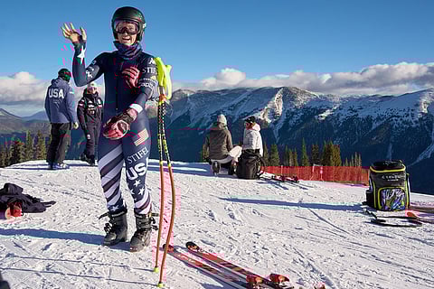 Mary Bocock waves at a teammate after arriving for practice with the U.S. Women's Ski Team at Copper Mountain, Colo.