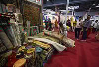 Imago/hindustan times : Indians check out products from Iran at the international trade fair at Pragati Maidan.