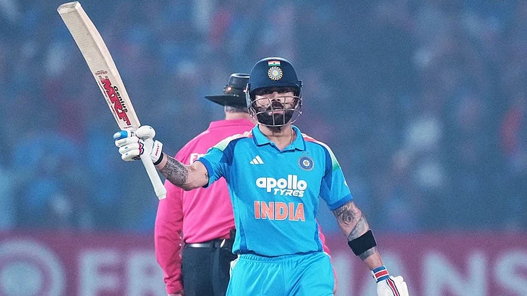 India's Virat Kohli celebrates his fifty runs during the first One Day International cricket match between India and New Zealand in Vadodara, India. - | Photo: AP/Ajit Solanki