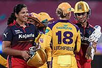 RCB Vs UPW, WPL 2026: Grace Harris Shines In Royal Challengers Bengaluru's Thumping Win | Photo: PTI/Kunal Patil : Royal Challengers Bengaluru's captain Smriti Mandhana, right, and Richa Ghosh, left, being congratulated by UP Warriorz's Phoebe Litchfield after winning the Women's Premier League (WPL) T20 cricket match between Royal Challengers Bengaluru and UP Warriorz, at the DY Patil Stadium in Navi Mumbai.
