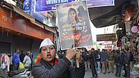 Photo: PTI : A protester holds a placard during a statewide bandh called by social groups and political organisations over the Ankita Bhandari murder case, in Dehradun | Representational
