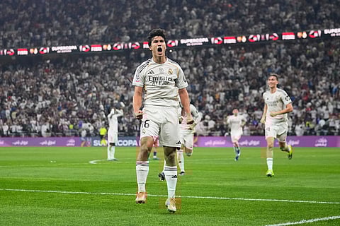 Real Madrid's Gonzalo Garcia celebrates after scoring against FC Barcelona during the Spanish Super Cup final soccer match at King Abdullah Sports City Stadium in Jeddah, Saudi Arabia.