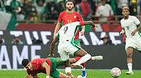 | Photo: AP/Mosa'ab Elshamy : Morocco's Adam Masina and Nigeria's Victor Osimhen fight for the ball during the Africa Cup of Nations semi-final match on Wednesday, January 14, 2026. 