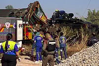 AP : This photo released from State Railway of Thailand, shows aid workers after a construction crane fell into a passenger train in Nakhon Ratchasima province, Thailand Wednesday, Jan. 14, 2026. 