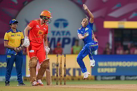 Mumbai Indians' Shabnim Ismail bowls during the Women's Premier League (WPL) 2026 T20 cricket match between Gujarat Giants and Mumbai Indians, at the DY Patil Stadium, in Navi Mumbai.
