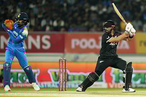 New Zealand's Daryl Mitchell plays a shot during the second One Day International cricket match between India and New Zealand in Rajkot, India.