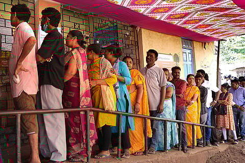 Voters in line waiting for their turn during the Maharashtra civic elections