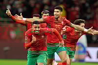 | Photo: AP/Mosa'ab Elshamy : Morocco players celebrate after winning after a penalty shootout during the Africa Cup of Nations semi-final match between Nigeria and Morocco in Rabat, Morocco.