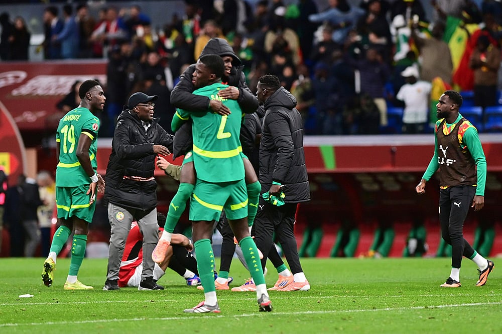 Senegal players celebrate their victory after the Africa Cup of Nations semifinal soccer match between Senegal and Egypt, in Tangier, Morocco. - | Photo: AP/Mohamed Bounaji