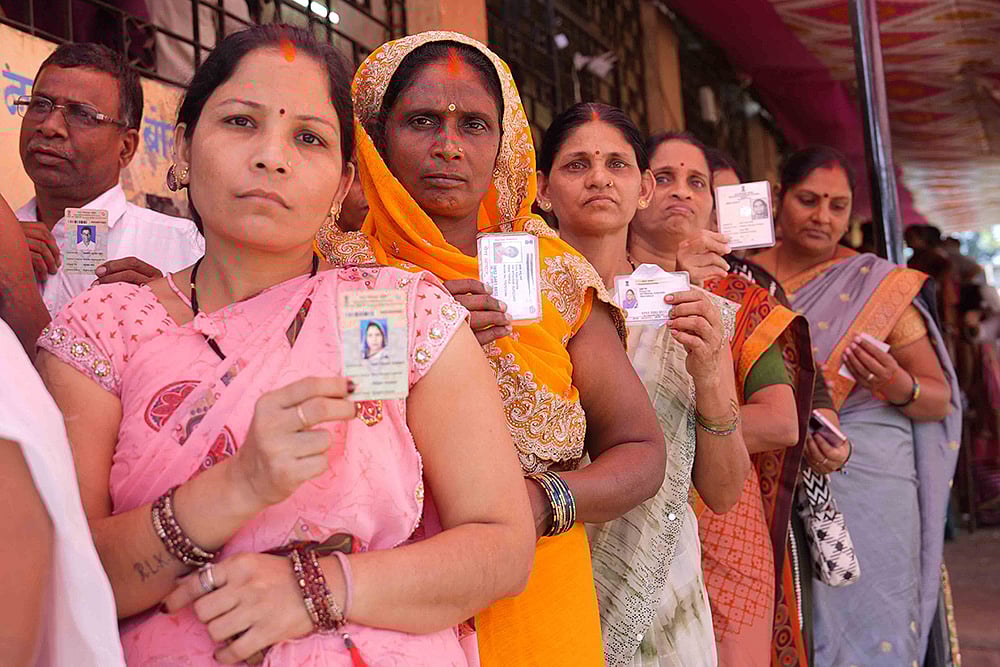During the Maharashtra civic elections, voters waited in line for their turn.
