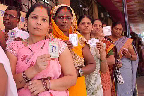 Voters in line waiting for their turn during the Maharashtra civic elections