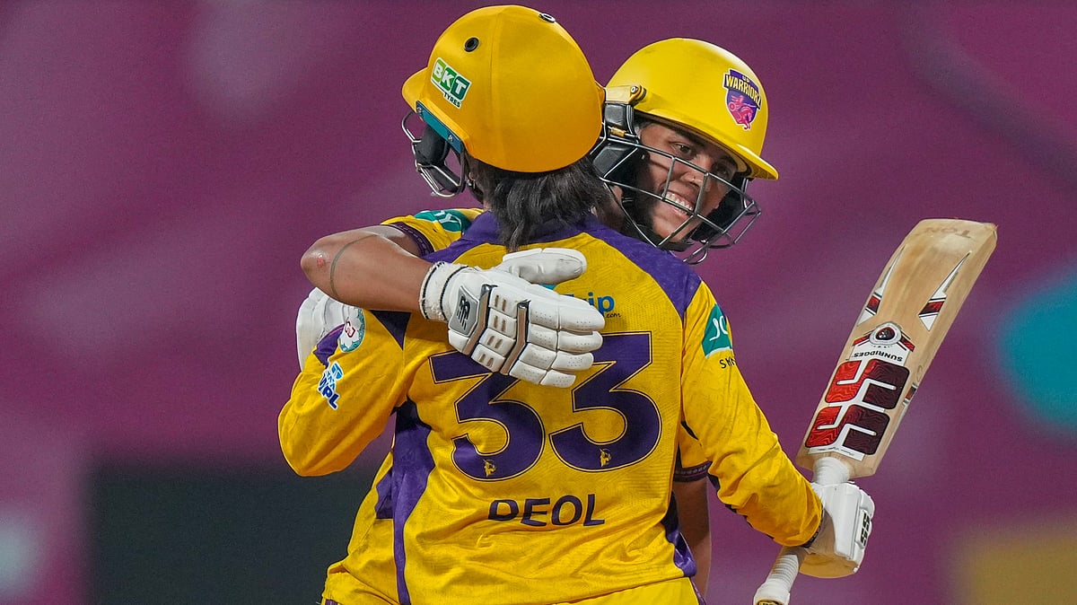 UP Warriorz' Harleen Deol celebrates with teammate Chloe Tryon after her half century during the Women's Premier League (WPL) 2026 T20 cricket match between Mumbai Indians and UP Warriorz, at the DY Patil Stadium, in Navi Mumbai, Thursday, Jan. 15, 2025. - | Photo: PTI/Kunal Patil