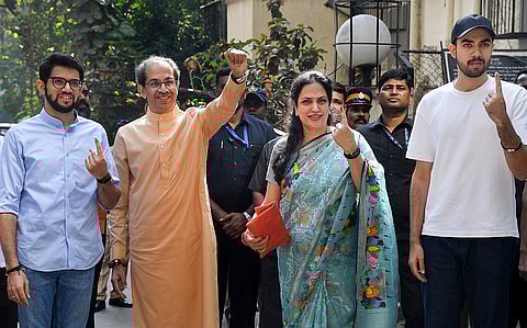 Shiv Sena (UBT) chief Uddhav Thackeray with wife Rashmi Thackeray and sons Aaditya Thackeray and Tejas Thackeray after casting his vote at a polling station during the Brihanmumbai Municipal Corporation (BMC) elections, in Mumbai, Maharashtra.