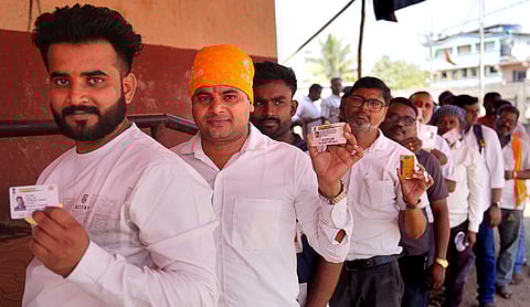 Voters in line waiting for their turn during the Maharashtra civic elections