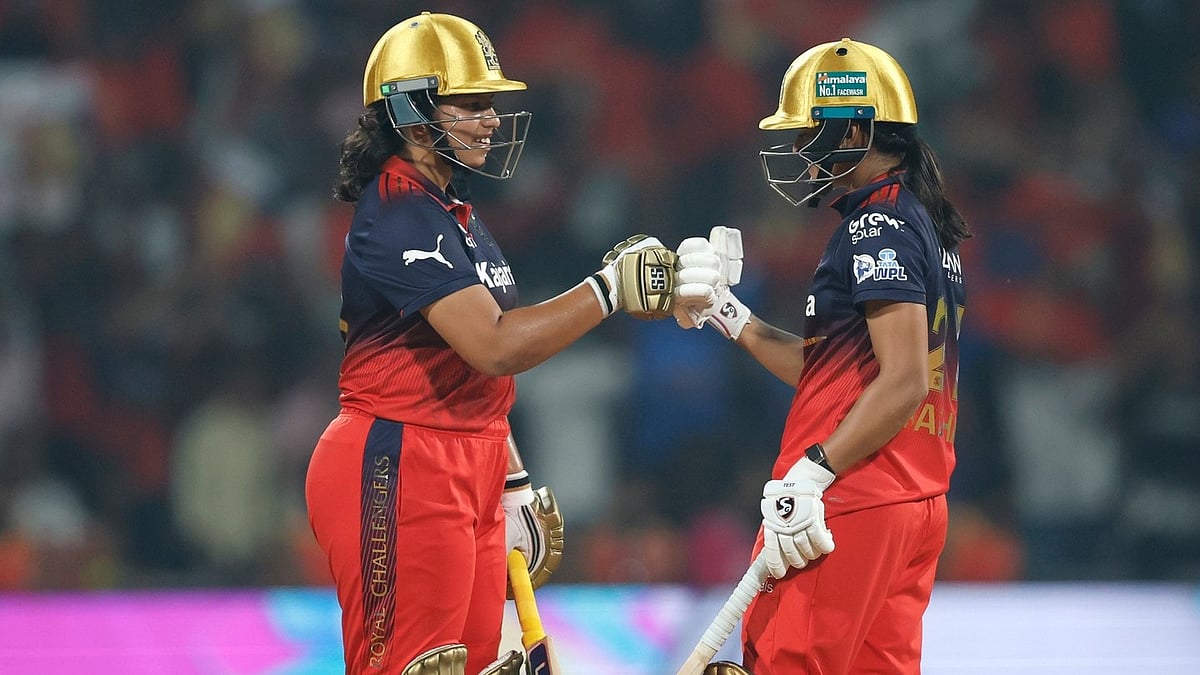 Royal Challengers Bengaluru's Radha Yadav and Richa Ghosh in action during the Women's Premier League match against Gujarat Giants on January 16, 2026. - | Photo: Instagram/wplt20