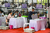 | Photo: PTI : Polling officials during counting of votes for the Nagpur Municipal Corporation election, at a centre in Nagpur, Maharashtra.
