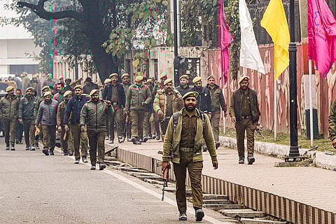 Police personnel arrive at Maulana Azad Stadium as part of security arrangements ahead of the Republic Day celebrations in Jammu.