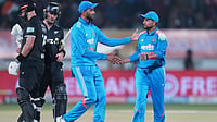 | Photo: AP/Ajit Solanki : India's Prasidh Krishna congratulates India's Kuldeep Yadav after taking the wicket of New Zealand's Will Young during the second One Day International cricket match between India and New Zealand in Rajkot, India, Wednesday, Jan. 14, 2026.