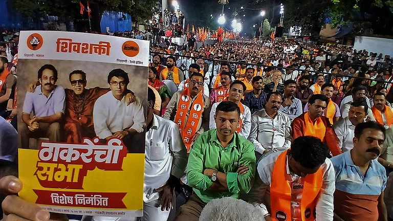 : Shiv Sena UBT and MNS supporters during joint campaign meeting of Shiv Sena (UBT) and the MNS alliance municipal corporation general elections on January 12, 2026 in Thane, India. (Photo by Praful Gangurde Hindustan Times) SS UBT Chief Uddhav Thackeray And MNS chief Raj Thackeray Address Joint Campaign Meeting For TMC Elections - IMAGO / Hindustan Times