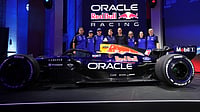 F1: Oracle Red Bull Racing And Racing Bulls Unveil Bold 2026 Liveries In Detroit Mark Thompson/Getty Images : Oracle Red Bull Racing team posing with the new F1 car.