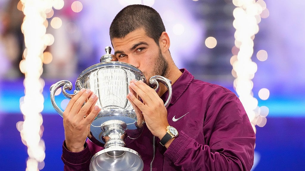 Carlos Alcaraz kisses the championship trophy after defeating Jannik Sinner, of Italy, in the men's singles final of the U.S. Open tennis championships. - File/AP