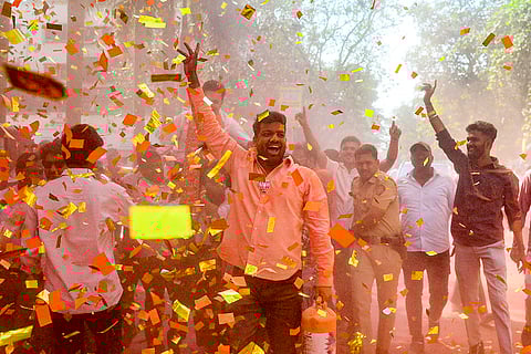 BJP workers celebrate amid confetti and ‘gulal’ as they celebrate a party’s candidate’s victory in the Navi Mumbai Municipal Corporation (NMMC) elections, at Kopar Khairane, in Navi Mumbai, Maharashtra.