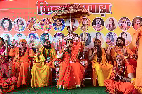 Kinnar Akhada Acharya Mahamandaleshwar Laxmi Narayan Tripathi, centre, gives an addressal after the 'Patta Abhishek' ritual of a newly appointed Mahamandaleshwar at the 'Magh Mela 2026', in Prayagraj.