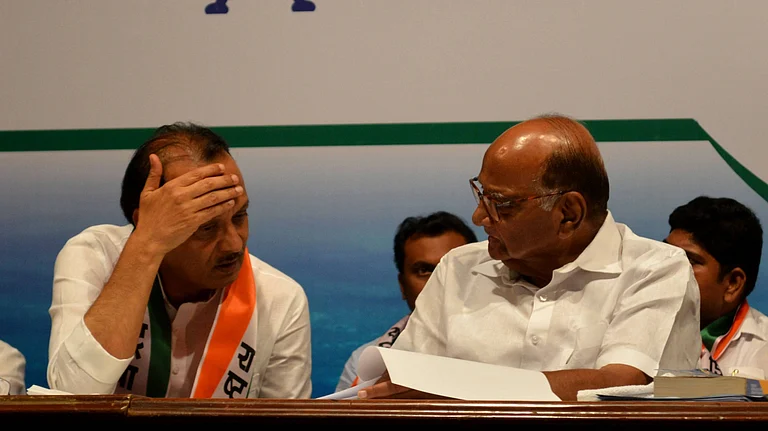 NCP leader Ajit Pawar with Sharad Pawar during the 20th NCP Foundation Day, at YB Chavan Centre, on June 10, 2019 in Mumbai, India
Source: IMAGO / Hindustan Times
- null