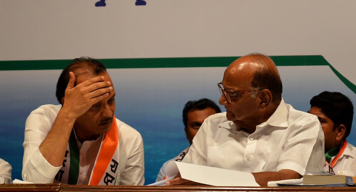 NCP leader Ajit Pawar with  Sharad Pawar during the 20th NCP Foundation Day, at YB Chavan Centre, on June 10, 2019 in Mumbai, India
Source: IMAGO / Hindustan Times 
