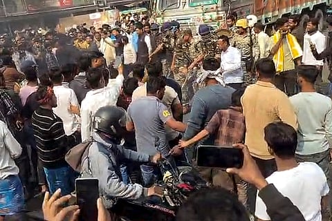 Agitators during a protest over the death of a migrant worker in Jharkhand, in Murshidabad, West Bengal. Fresh unrest gripped West Bengal's Murshidabad district on Saturday as protesters again blocked National Highway-12 and railway tracks at West Bengal's Beldanga. 