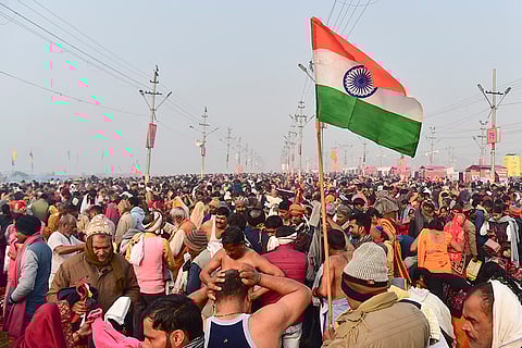 People gather to take a holy dip at the Sangam ahead of 'Mauni Amavasya', during the ongoing 'Magh Mela' festival, in Prayagraj.