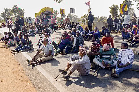Protesters block roads during a 'Jharkhand Bandh' called by various tribal outfits demanding action in a village head's muder case, in Ranchi.