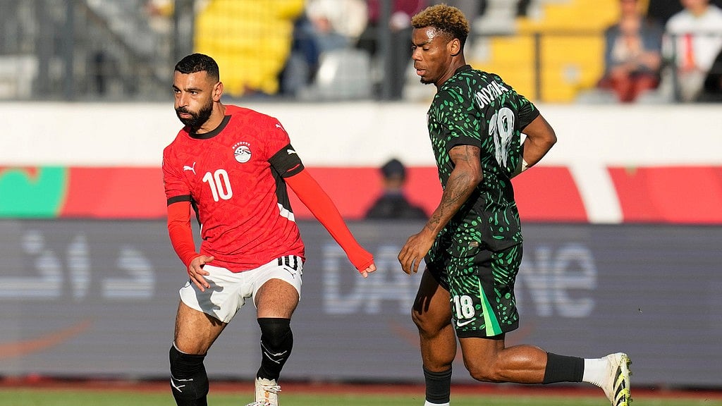 Egypt's Mohamed Salah is challenged by Nigeria's Raphael Onyedika during the Africa Cup of Nations third place game in Casablanca, Morocco. - Photo: AP