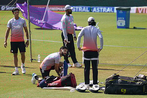 India's Virat Kohli, centre, with others during a training session ahead of the third ODI cricket match between India and New Zealand, at Holkar Cricket Stadium, in Indore, Madhya Pradesh.