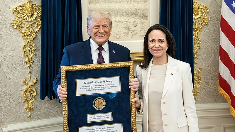 Venezuelan Nobel Peace Prize winner presents her medal to Trump