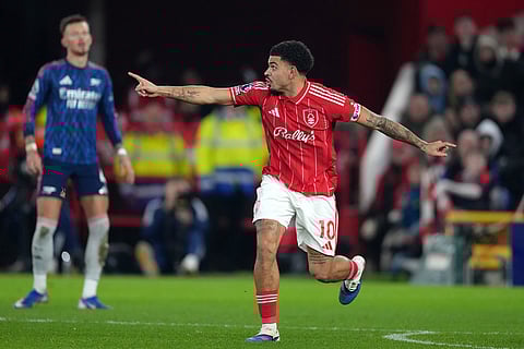 Nottingham Forest's Morgan Gibbs-White gestures during the English Premier League soccer match between Nottingham Forest and Arsenal in Nottingham, England.