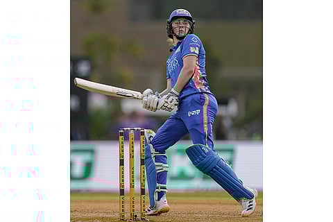 Mumbai Indians' Nicola Carey plays a shot during the Women's Premier League (WPL) T20 cricket match between Mumbai Indians and UP Warriorz, at the DY Patil Stadium, in Navi Mumbai.