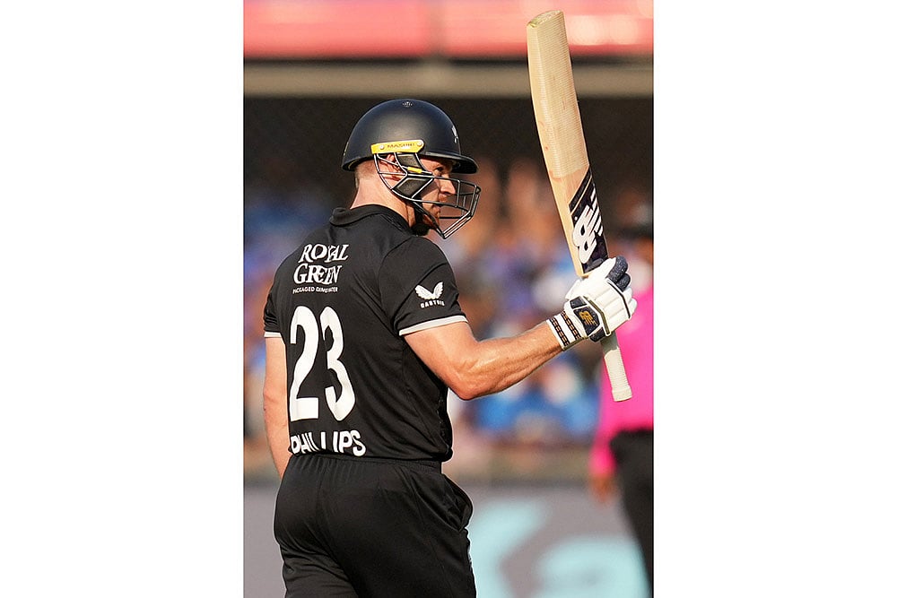 New Zealands Glenn Phillips celebrates his fifty runs 