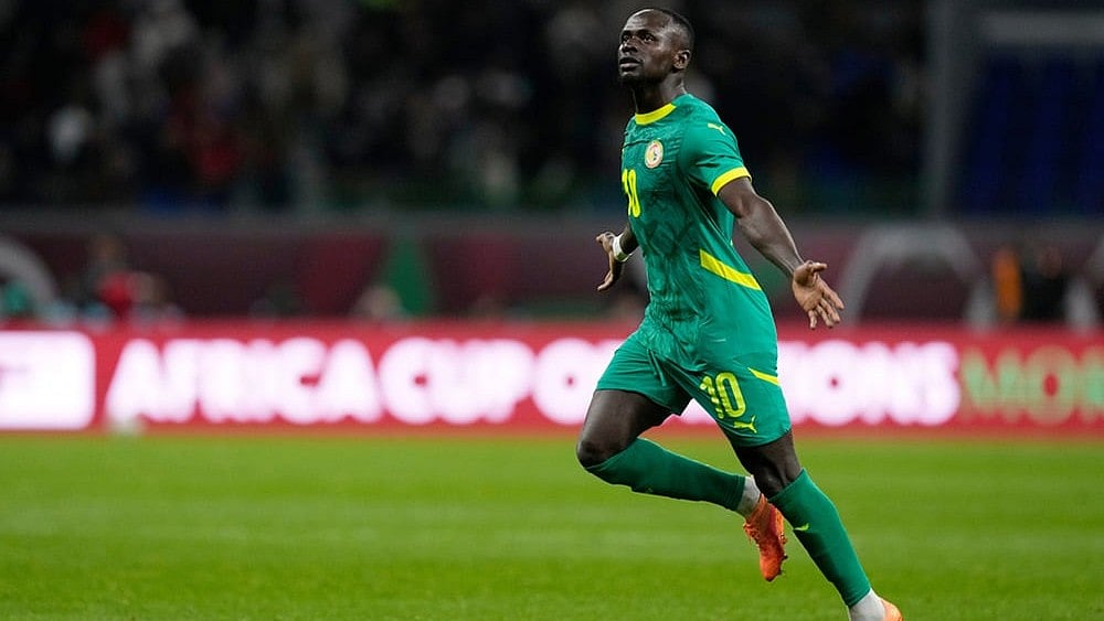 Senegal's Sadio Mane celebrates after scoring his side's opening goal during the Africa Cup of Nations semifinal soccer match between Senegal and Egypt, in Tangier, Morocco. - | Photo: AP/Themba Hadebe