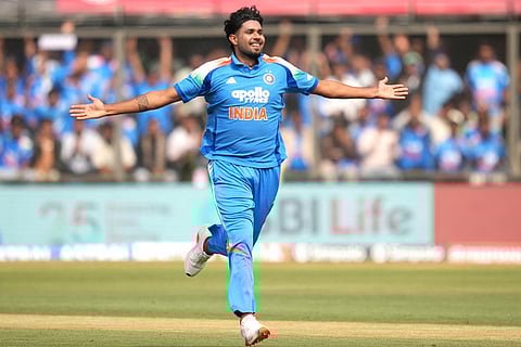 India's Harshit Rana celebrates the wicket of New Zealand's Devon Conway during the third One Day International cricket match between India and New Zealand in Indore, India.