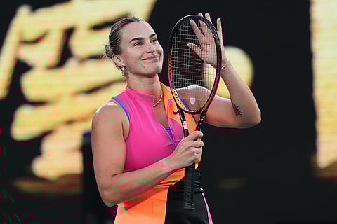 Aryna Sabalenka of Belarus reacts after defeating Tiantsoa Rakotomanga Rajaonah of France in their first round match at the Australian Open tennis championship in Melbourne, Australia.