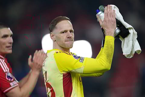 Nottingham Forest's goalkeeper Matz Sels applauds the fans at the end of the English Premier League soccer match between Nottingham Forest and Arsenal in Nottingham, England.