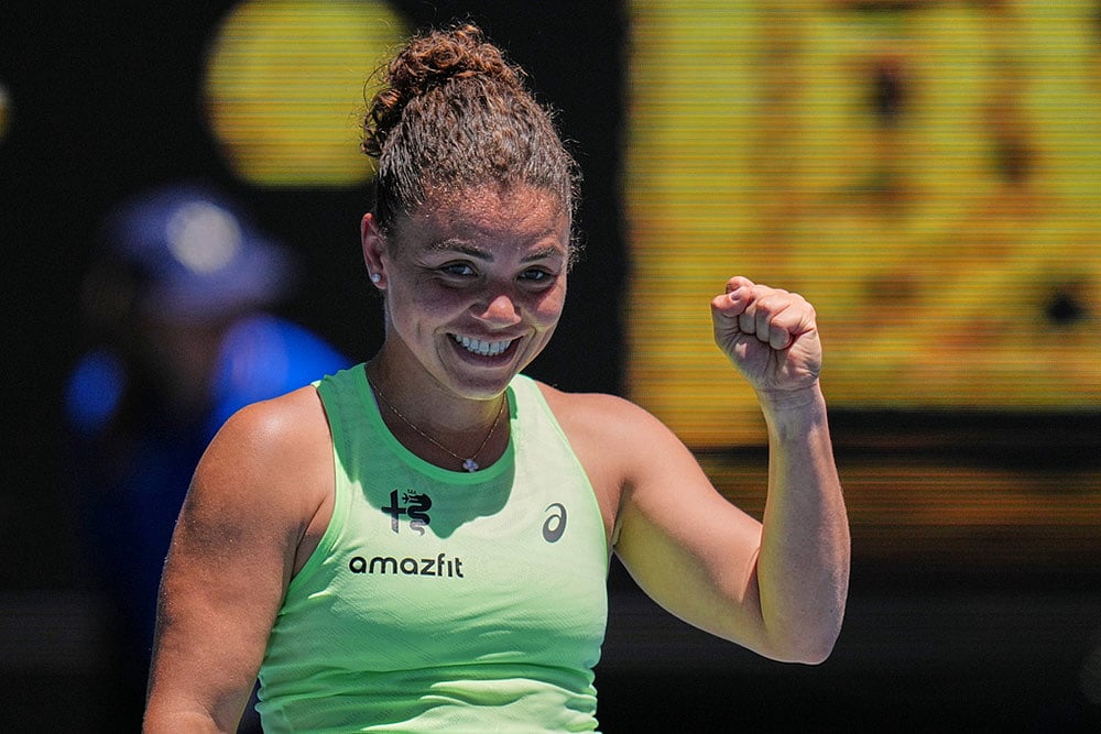 Jasmine Paolini of Italy celebrates after defeating Aliaksandra Sasnovich of Belarus in their first round match at the Australian Open tennis championship in Melbourne, Australia - | Photo: AP/Dita Alangkara