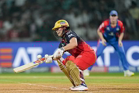 Royal Challengers Bengaluru's Georgia Voll plays a shot during the Women's Premier League (WPL) T20 cricket match between Royal Challengers Bengaluru and Delhi Capitals, at the DY Patil Stadium, in Navi Mumbai.